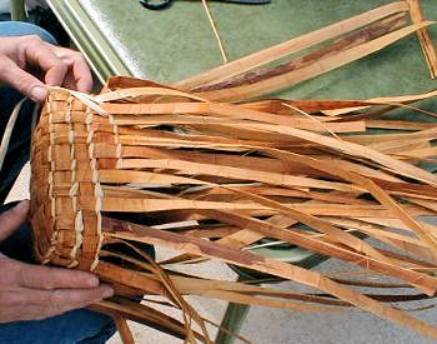 A cedar strip basket in the making.